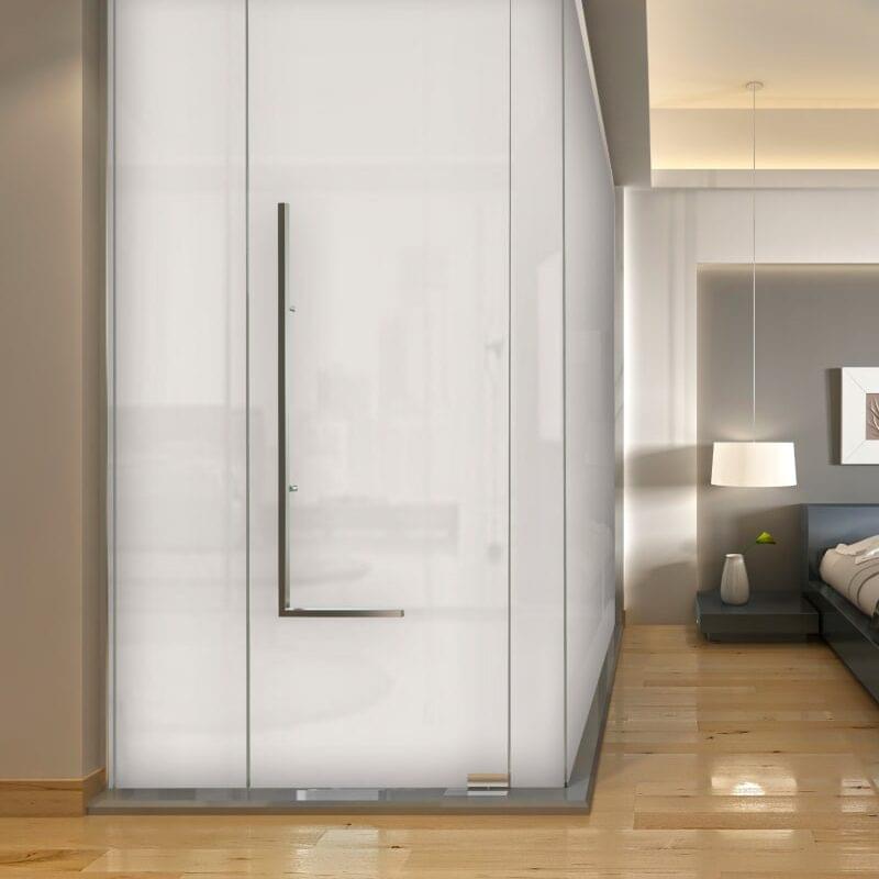 Electric privacy glass installed in a modern UAE office, switching between clear and frosted.