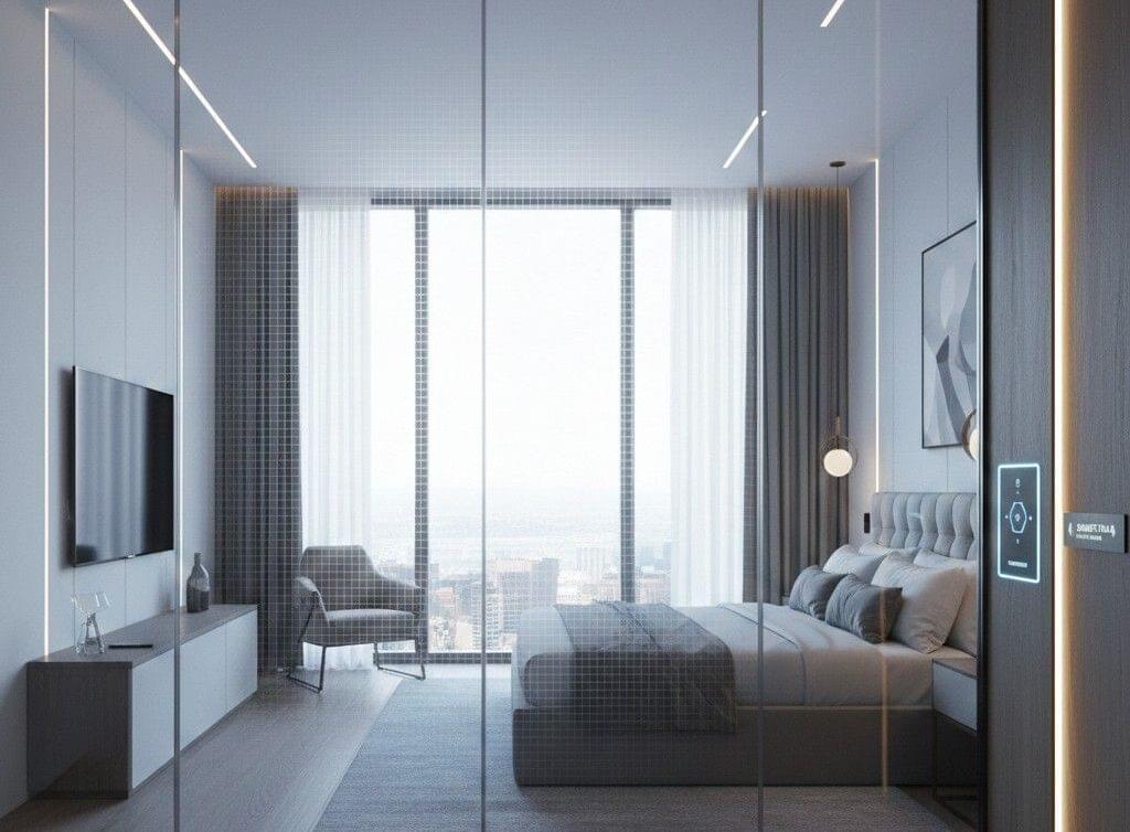 Smart film installed on hotel bathroom glass providing instant privacy while maintaining a modern, open design